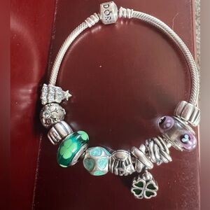 Pandora bracelet with 8 charms and 2 separators